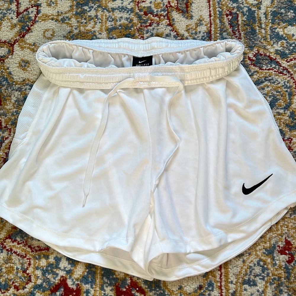 White Nike shorts
